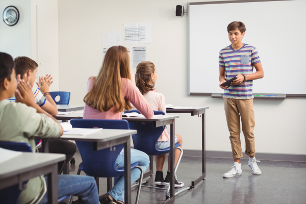 illustration: boy speaking to class