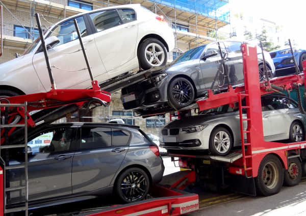 illustration: cars on a car transporter truck