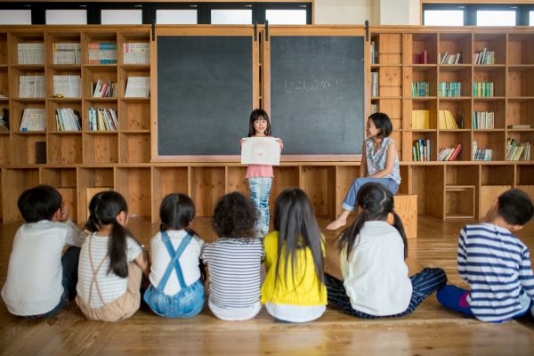 illustration: girl sharing with class