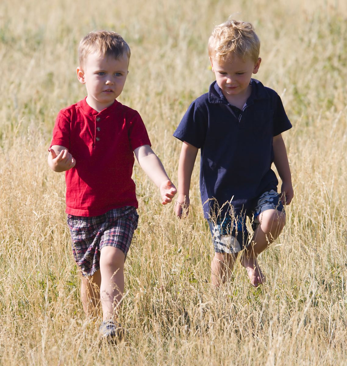 boys in the field talking