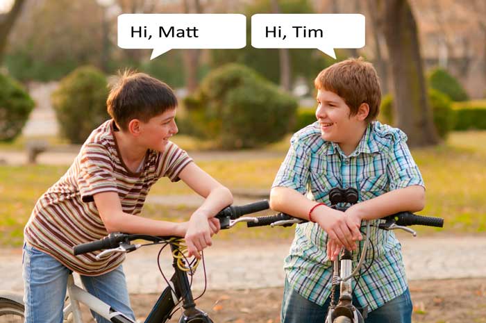 two boys on bikes