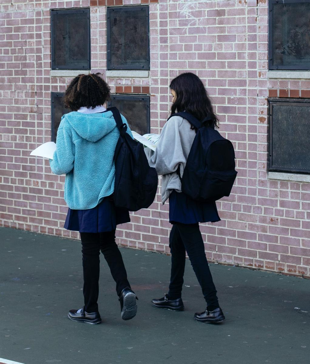 two girls walking to school